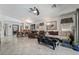 Spacious living room featuring tile floors, comfortable seating, and an open layout great for entertaining at 3495 Eagle Bend St, Las Vegas, NV 89122