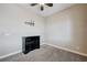 Carpeted bedroom featuring tv mount and a stylish black dresser at 4523 Herbert River Ave, Las Vegas, NV 89141