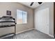 Exercise room with treadmill, natural light, and closet at 4523 Herbert River Ave, Las Vegas, NV 89141