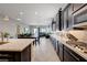 Spacious open floor plan featuring a well-appointed kitchen, dining space, and living area at 4523 Herbert River Ave, Las Vegas, NV 89141