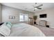 Bright main bedroom with a ceiling fan, neutral walls, and lots of natural light at 4523 Herbert River Ave, Las Vegas, NV 89141