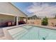 Backyard pool and patio area are perfect for entertaining and outdoor activities at 4523 Herbert River Ave, Las Vegas, NV 89141