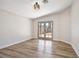 Bright bedroom with wood floors and French doors leading outside at 5004 Celebrity Cir, Las Vegas, NV 89119