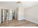 Bedroom with wood floors and neutral paint. Includes views to a bath and hallway at 5004 Celebrity Cir, Las Vegas, NV 89119