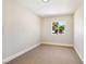 Bedroom with carpeted floors, neutral paint, baseboards and one window at 5004 Celebrity Cir, Las Vegas, NV 89119
