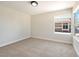Bedroom with carpeted floors, neutral walls, and a large window at 5004 Celebrity Cir, Las Vegas, NV 89119