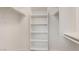 Walk-in closet with built-in shelving and ample storage space at 5004 Celebrity Cir, Las Vegas, NV 89119