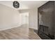 Open living space with wood-look flooring, fireplace, and lots of natural light at 5004 Celebrity Cir, Las Vegas, NV 89119
