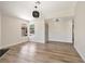 Bright living area with natural light, wood-look floors, and neutral walls at 5004 Celebrity Cir, Las Vegas, NV 89119