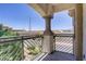 Balcony featuring a post and railing overlooking trees, and the surrounding area at 5112 Harvest Time St # 201, Las Vegas, NV 89130