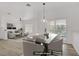 Open floor plan with view of the dining and living rooms plus access to the patio at 5112 Harvest Time St # 201, Las Vegas, NV 89130