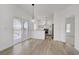Open-concept kitchen with stainless steel appliances and access to the balcony at 5112 Harvest Time St # 201, Las Vegas, NV 89130