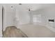 Bright living room featuring neutral carpeting and wood-look flooring at 5112 Harvest Time St # 201, Las Vegas, NV 89130