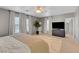 Bright main bedroom with large windows, ceiling fan, and ample space for furniture at 554 Haunts Walk Ave, Las Vegas, NV 89178