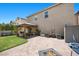 Extensive backyard area with patio, lawn, and well-kept grounds for entertaining guests or enjoying outdoor activities at 5656 Fast Payout Ct, Las Vegas, NV 89122