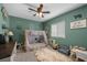 bedroom in green with tented bed and adventure theme at 5656 Fast Payout Ct, Las Vegas, NV 89122