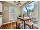 Dining area with table, chairs, and a view of the outdoor patio at 6125 Broken Slate Way, Las Vegas, NV 89139