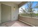 Private balcony offers a relaxing outdoor space with views of mature trees and blue sky at 6160 Rumrill St # 202, Las Vegas, NV 89113