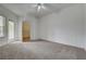 Bedroom featuring a ceiling fan, carpeted floors, walk in closet, and natural light at 6160 Rumrill St # 202, Las Vegas, NV 89113