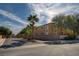 Attractive condo complex with mature landscaping and clear blue sky in a desirable location at 6160 Rumrill St # 202, Las Vegas, NV 89113