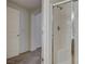Walk in shower with glass doors and tile walls at 6160 Rumrill St # 202, Las Vegas, NV 89113