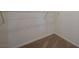Walk-in closet with carpet flooring and metal shelves at 6160 Rumrill St # 202, Las Vegas, NV 89113