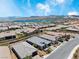 Beautiful aerial view of the community with a lake and mountain backdrop at 64 Lake Oasis St, Henderson, NV 89011