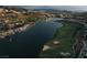 Luxury homes border this large body of water and lush green golf course, perfect for scenic outdoor living at 64 Lake Oasis St, Henderson, NV 89011