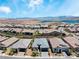 Panoramic aerial view of the neighborhood showcases the well-maintained homes at 64 Lake Oasis St, Henderson, NV 89011