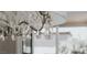 Elegant dining area chandelier with crystal accents and soft lighting at 64 Lake Oasis St, Henderson, NV 89011