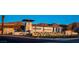 A view of the Del Webb community sign, a beautiful desert landscape, and blue skies at 64 Lake Oasis St, Henderson, NV 89011