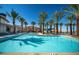 A view of the community pool and lounge area; perfect for swimming and relaxing in the sun at 64 Lake Oasis St, Henderson, NV 89011
