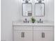 Bathroom vanity featuring double sinks, modern fixtures, and sleek design at 6456 First View Ave, Las Vegas, NV 89142