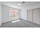 Well-lit bedroom with closet and window view at 6456 First View Ave, Las Vegas, NV 89142