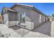 Charming home exterior showcasing a well-maintained side yard, concrete walkway, and textured facade at 6456 First View Ave, Las Vegas, NV 89142