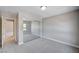 Bedroom with carpet, closet with mirrored doors, and neutral walls, offering a peaceful retreat at 6564 Baroque Ave, Las Vegas, NV 89139