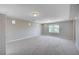 Spacious bonus room with plush carpet, recessed lighting, and a large window at 6564 Baroque Ave, Las Vegas, NV 89139