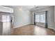 Dining room features tile floors, large window with curtains, and chandelier lighting at 6564 Baroque Ave, Las Vegas, NV 89139