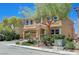 Attractive two-story home with a well-maintained front yard, mature trees, and a spacious two-car garage at 6564 Baroque Ave, Las Vegas, NV 89139