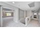 Hallway landing with view into another living space at 6564 Baroque Ave, Las Vegas, NV 89139