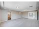 Spacious living room featuring neutral paint, recessed lighting, and plush carpet at 6564 Baroque Ave, Las Vegas, NV 89139