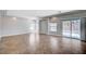Spacious living room with tile flooring and sliding glass door to the backyard at 6564 Baroque Ave, Las Vegas, NV 89139
