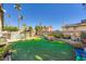 Large backyard with artificial turf, swimming pool, basketball court and patio at 6616 Celeste Ave, Las Vegas, NV 89107