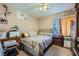 Bedroom with carpet, ceiling fan, window with curtains and a comfortable bed at 6616 Celeste Ave, Las Vegas, NV 89107