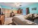 Comfortable bedroom with a ceiling fan, curtains, and large windows offering ample lighting at 6616 Celeste Ave, Las Vegas, NV 89107