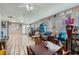 Large living area offering tile flooring and a ceiling fan fixture at 6616 Celeste Ave, Las Vegas, NV 89107