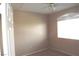Bedroom with a window and standard ceiling fan at 75 N Valle Verde Dr # 225, Henderson, NV 89074