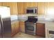 Well-equipped kitchen with stainless steel appliances and granite countertops at 75 N Valle Verde Dr # 225, Henderson, NV 89074