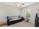 Bedroom with ceiling fan, carpeted floor and cat tree at 7640 Woven Memories St, Las Vegas, NV 89149