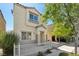 Charming two-story home featuring a covered front porch and a driveway at 7640 Woven Memories St, Las Vegas, NV 89149
